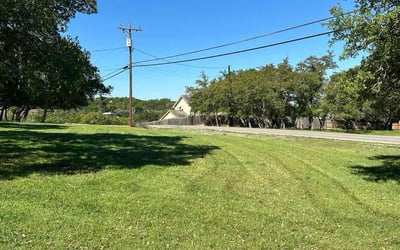 Photo of Courtney C.'s yard after getting lawn care in Canyon Lake, TX