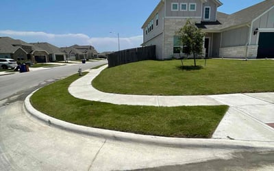 Photo of Lauren M.'s yard after getting lawn care in Del Valle, TX