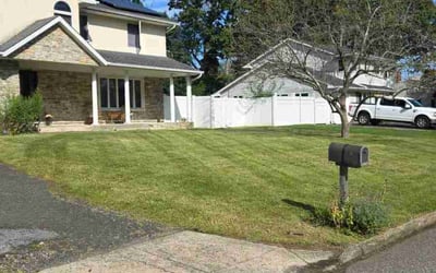 Photo of Carleen T.'s yard after getting lawn care in Great Neck, NY
