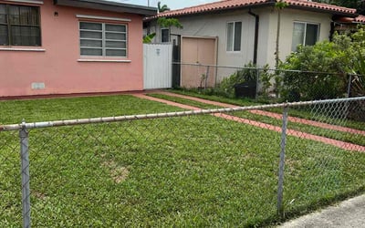 Photo of Elaine W.'s yard after getting lawn care in North Miami Beach, FL