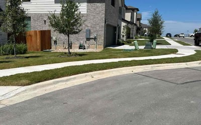 Photo of Jessie W.'s yard after getting lawn care in Luling, TX