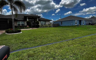 Photo of Remy W.'s yard after getting lawn care in Port St. Lucie, FL