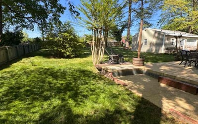 Photo of Laura J.'s yard after getting lawn care in Aylett, VA