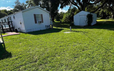 Photo of Cassidy C.'s yard after getting lawn care in Auburndale, FL