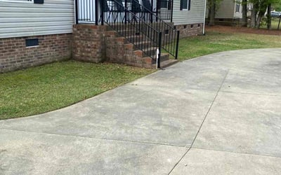 Photo of Jadi T.'s yard after getting lawn care in Goldsboro, NC