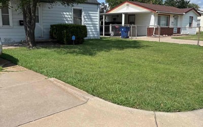 Photo of Trey H.'s yard after getting lawn care in Ennis, TX