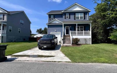 Photo of Maria S.'s yard after getting lawn care in Hampton, VA