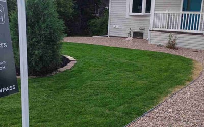Photo of Kirsten M.'s yard after getting lawn care in Dover, FL