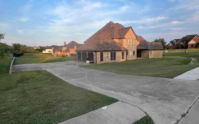 Photo of Sandy X.'s yard after getting lawn care in Cedar Hill, TX