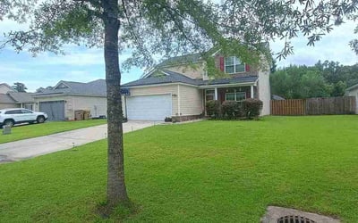 Photo of Jilly B.'s yard after getting lawn care in Richmond Hill, GA