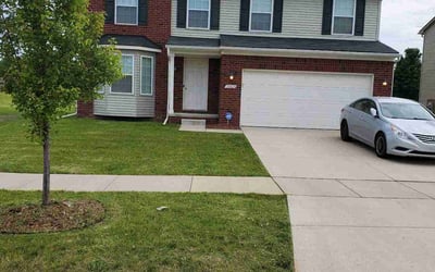 Photo of chet B.'s yard after getting lawn care in Romulus, MI