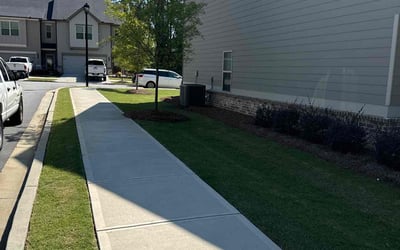 Photo of Amanda C.'s yard after getting lawn care in Lilburn, GA