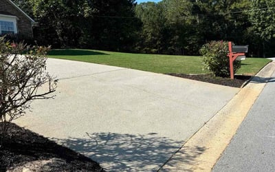 Photo of Carita B.'s yard after getting lawn care in Dallas, GA