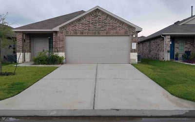 Photo of Cynthia B.'s yard after getting lawn care in Montgomery, TX