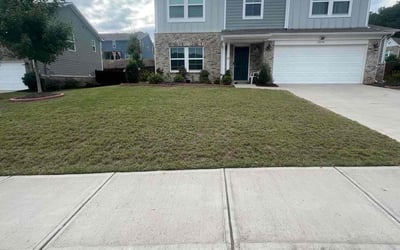 Photo of Rhiannon T.'s yard after getting lawn care in Cumming, GA