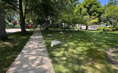 Photo of Hannah K.'s yard after getting lawn care in Woodstock, GA
