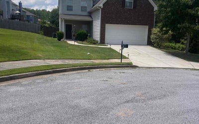Photo of Alexandria A.'s yard after getting lawn care in Lithia Springs, GA