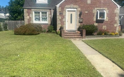 Photo of Andrew B.'s yard after getting lawn care in Central Islip, NY