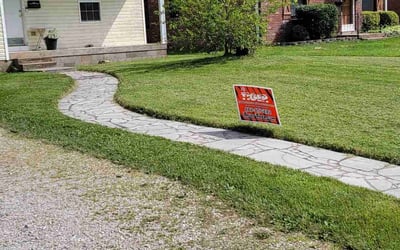 Photo of Camela M.'s yard after getting lawn care in Waterloo, IL
