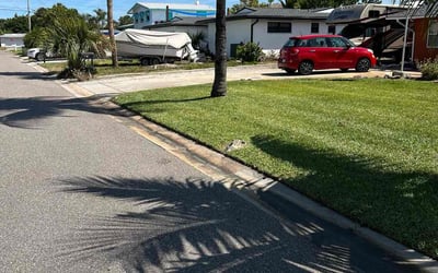 Photo of Scarlett M.'s yard after getting lawn care in Satellite Beach, FL