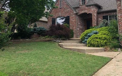 Photo of Regina C.'s yard after getting lawn care in Collinsville, OK