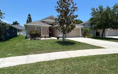 Photo of Amber F.'s yard after getting lawn care in Cocoa Beach, FL