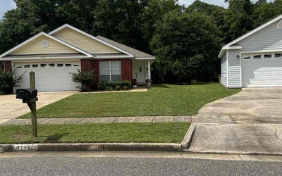 Photo of Traci T.'s yard after getting lawn care in Saraland, AL