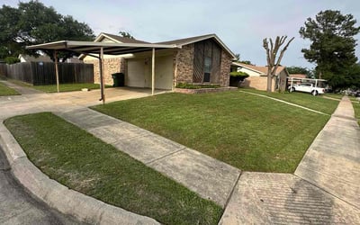 Photo of Jane L.'s yard after getting lawn care in Decatur, TX