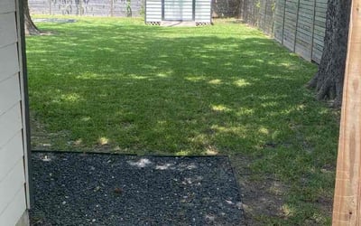 Photo of Louise M.'s yard after getting lawn care in Cedar Creek, TX