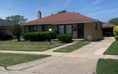 Photo of Mary B.'s yard after getting lawn care in Westland, MI