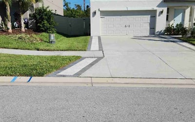 Photo of Yvonne M.'s yard after getting lawn care in Holiday, FL