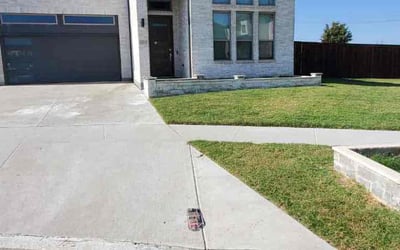 Photo of Nicole B.'s yard after getting lawn care in Frisco, TX