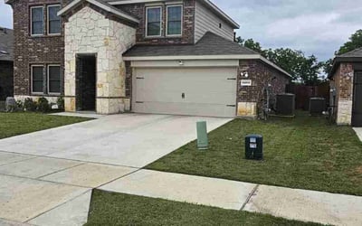 Photo of Jennifer M.'s yard after getting lawn care in Denton, TX