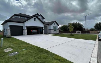 Photo of Tencianah J.'s yard after getting lawn care in Natalia, TX