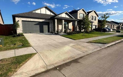Photo of Charlotte W.'s yard after getting lawn care in Balch Springs, TX