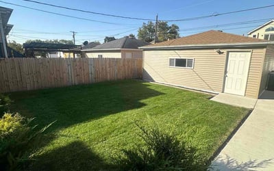 Photo of JoAnn P.'s yard after getting lawn care in Elmwood Park, IL