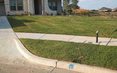 Photo of Lisa R.'s yard after getting lawn care in Benbrook, TX