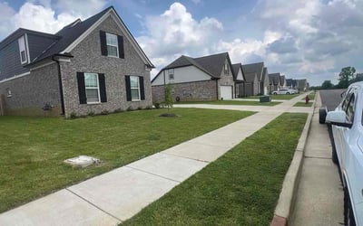 Photo of Genevieve T.'s yard after getting lawn care in Millington, TN