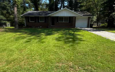 Photo of Christy K.'s yard after getting lawn care in Jonesboro, GA