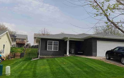 Photo of Barbara L.'s yard after getting lawn care in Cedar Rapids, IA