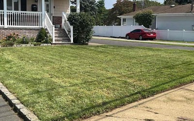 Photo of Brandon M.'s yard after getting lawn care in East Meadow, NY