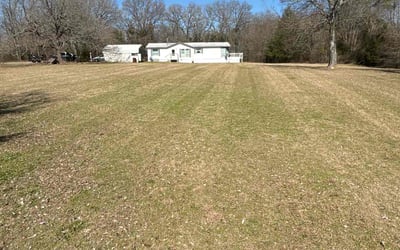Photo of Dalton S.'s yard after getting lawn care in Quinlan, TX
