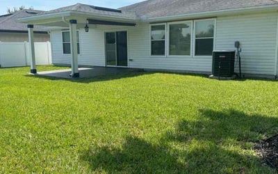 Photo of Cristina S.'s yard after getting lawn care in Riviera Beach, FL