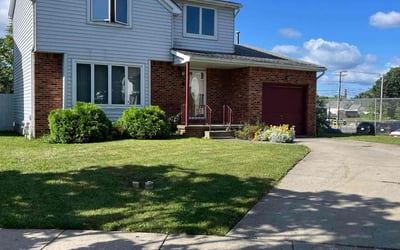 Photo of Helen H.'s yard after getting lawn care in Hamburg, NY