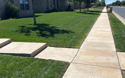 Photo of Jalaina T.'s yard after getting lawn care in Amarillo, TX