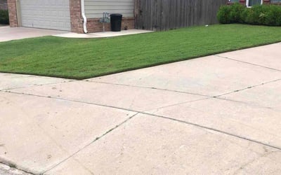Photo of Emily H.'s yard after getting lawn care in Jenks, OK