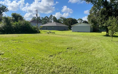 Photo of Margaret W.'s yard after getting lawn care in Indialantic, FL