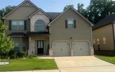 Photo of Lauren C.'s yard after getting lawn care in Ball Ground, GA