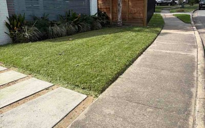 Photo of Kiana H.'s yard after getting lawn care in Crestview, FL