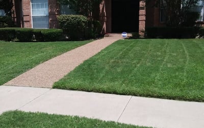 Photo of Tamara R.'s yard after getting lawn care in Quinlan, TX